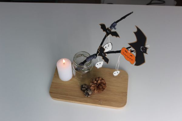 Centro de mesa Halloween con velas y murciélagos