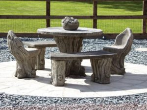 Conjunto de mesa y sillas para jardín de piedra