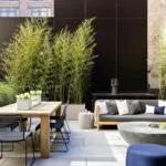 Terraza moderna sin techo como sala de comedor exterior