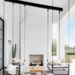 Terraza moderna techada con muebles sujetados al techo