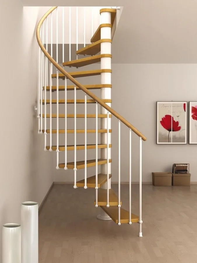 Escalera de caracol de una pieza en blanco metal y madera