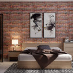 Dormitorio con pared de ladrillo y cuadros minimalistas