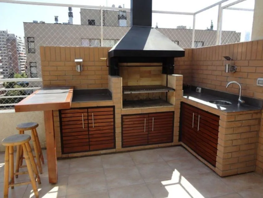 Asador lujoso de ladrillo con fregadero