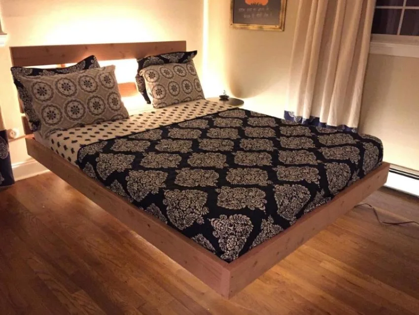 cama moderna de madera flotante con iluminacion inferior y en cabecera
