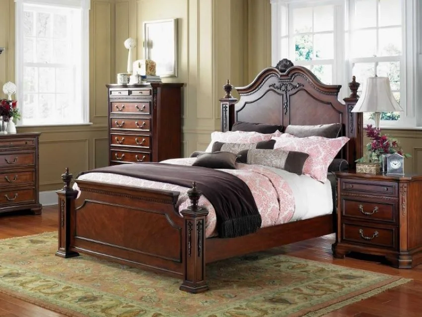 cama clasica de madera maciza con mesas de noche separadas 